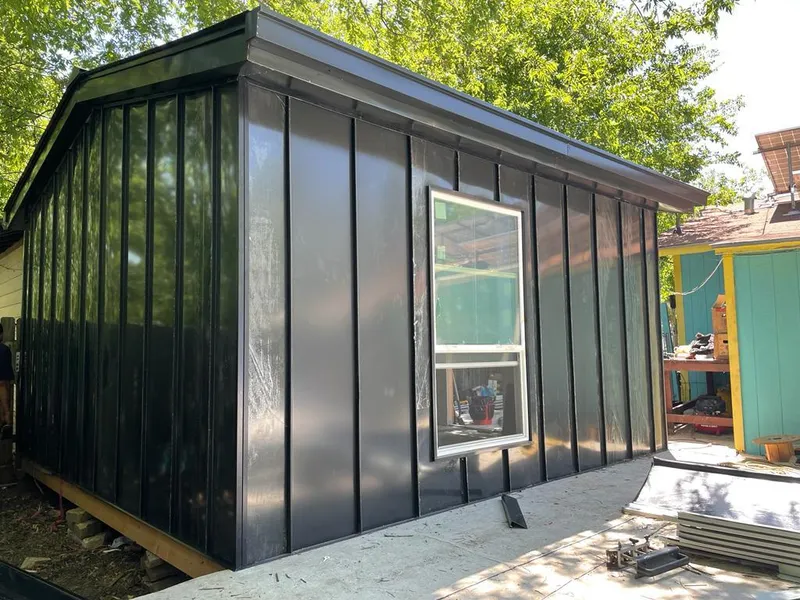 Black standing seam metal wall panels for Roof Inspection in Beech Grove