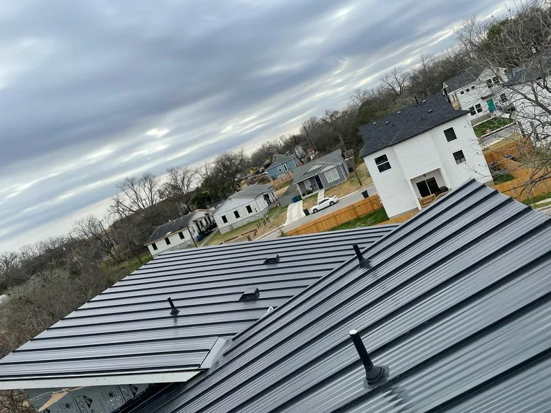 Standing seam metal roof panels with vents for Skylight Repair in Beech Grove